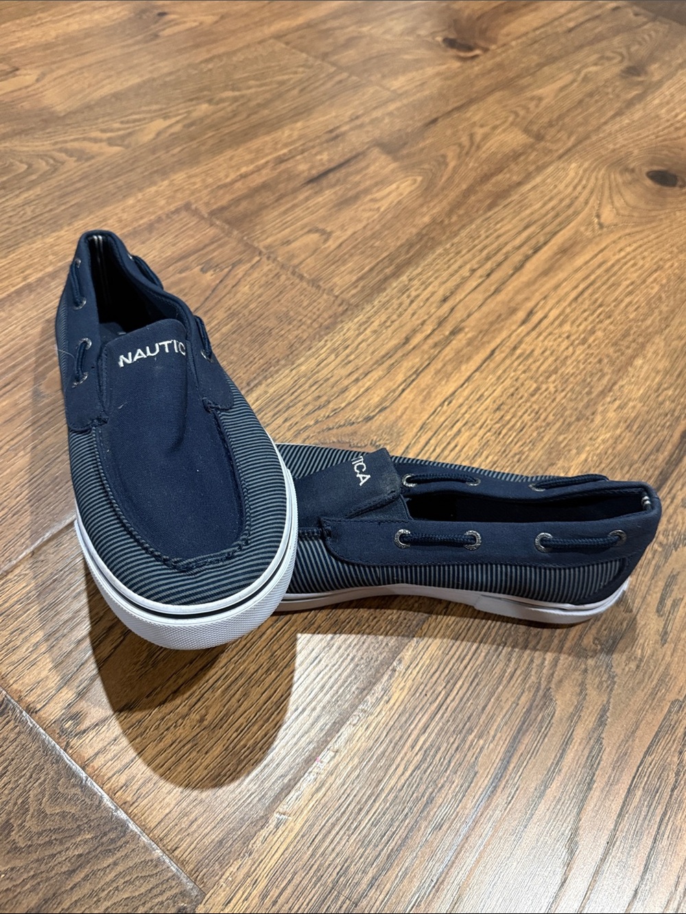 Nautica Men’s Navy Slip-On Canvas Boat Sneakers with White Sole